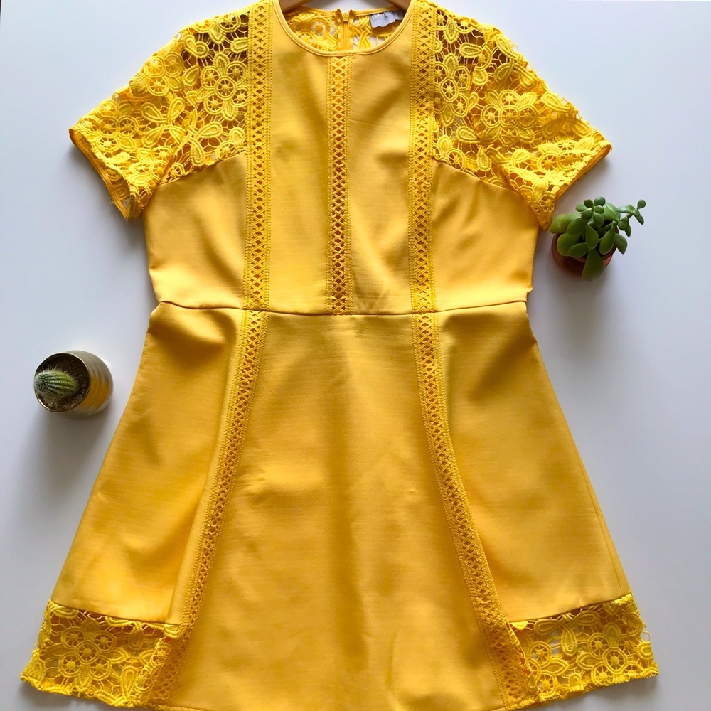 Fit and flare Yellow dress with crochet lace details Size 14